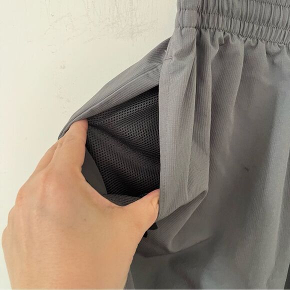 Under Armour Grey Loose Lined Ankle Zipper Track Pants - Picture 5 of 9